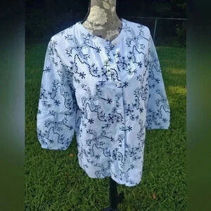 National blue and white , embroidered blouse.